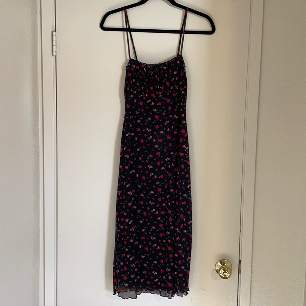 Princess Polly “Marlee” dress. Black floral mesh over black slip, midi length.